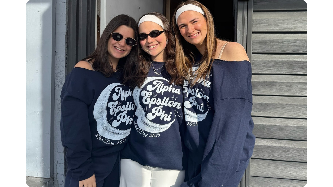 Alpha Epsilon Phi members wearing navy blue crewnecks from Fresh Prints