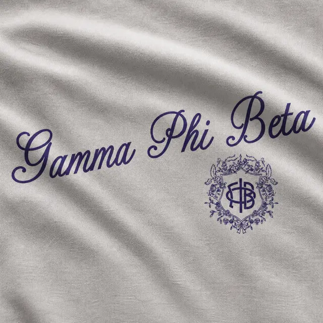 Gamma Phi Beta Script Text with Floral Crest in Purple PR Sweater