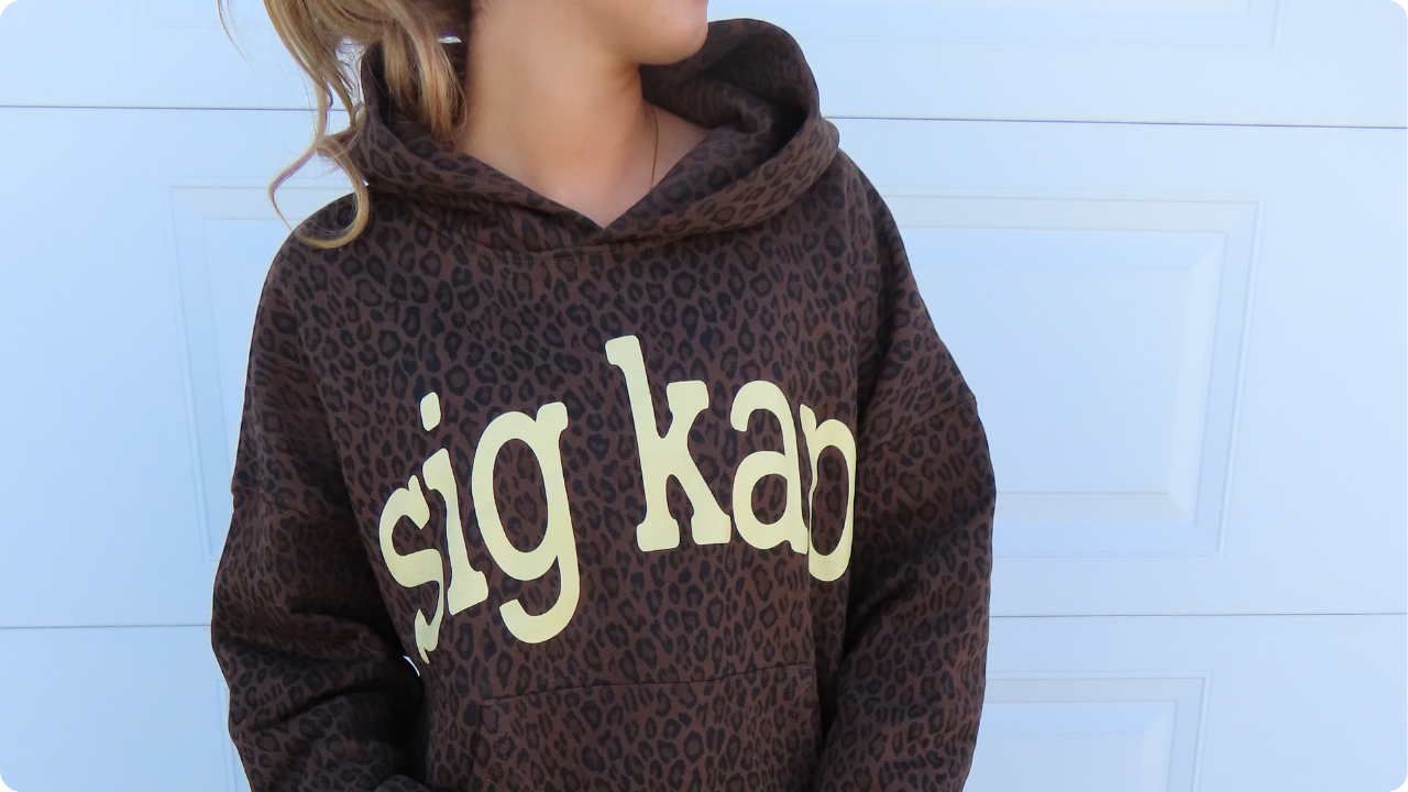 Sigma Kappa sorority girl wearing a leopard print hoodie