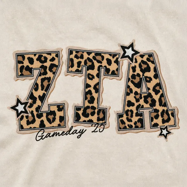 Zeta Tau Alpha ZTA Cheetah Printed Text with Stars Game Day Sweater