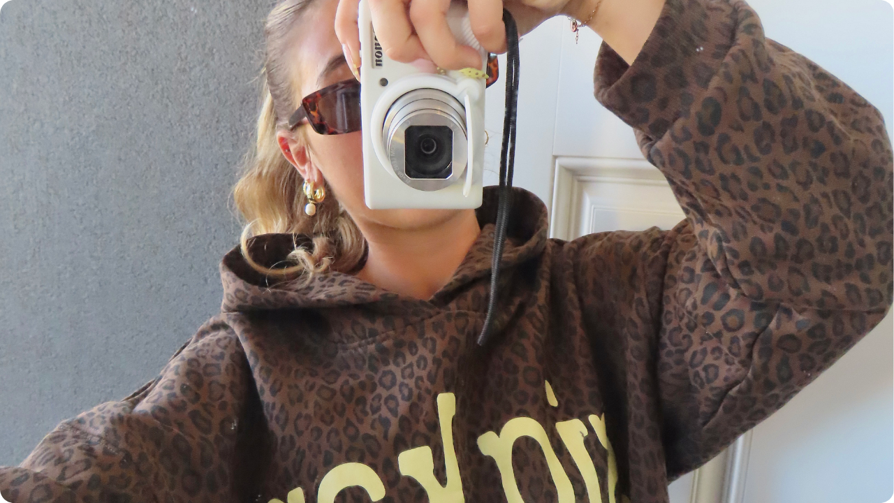 Sigma Kappa girl wearing leopard print hoodie