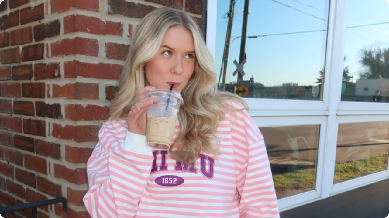 Blaire's friend wearing the Fresh Prints Denver Graphic Mockneck in Baby Pink with White Stripes