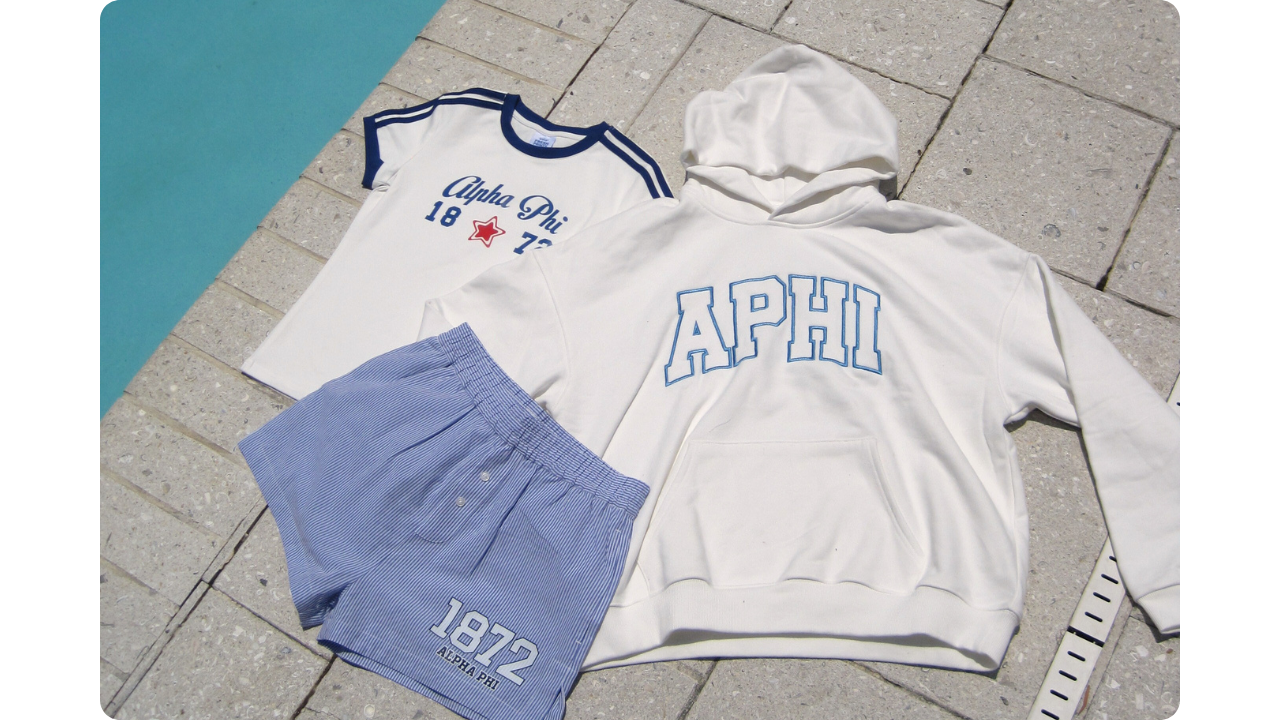 Flatlay photo of 3 different pieces of sorority merch