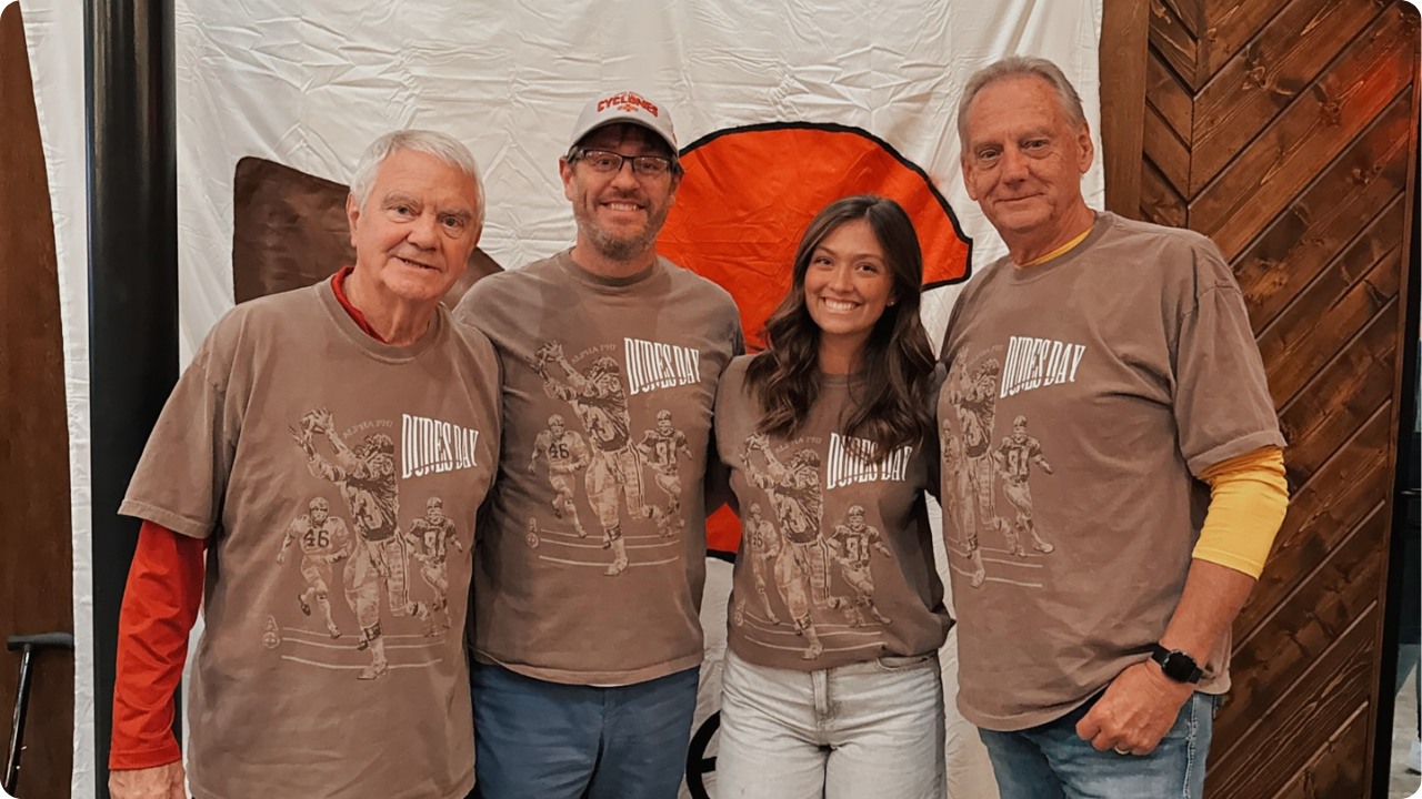 Sorority girl and male relatives wearing Alpha Phi Dudes Day merch